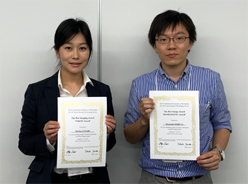 Dr. Hirotoshi SHIBUYA (right) honored with the HAMAMATSU Award and Ms. Ruriko TANABE (left) with the NIKON Award